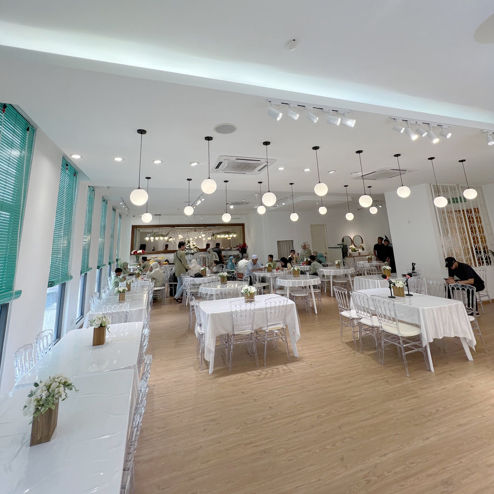 Styled venue with tables and chairs